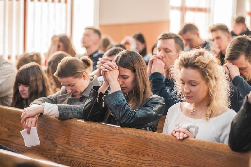 ReligousFreedomInitiative School Without Walls leaders praying at a conference
