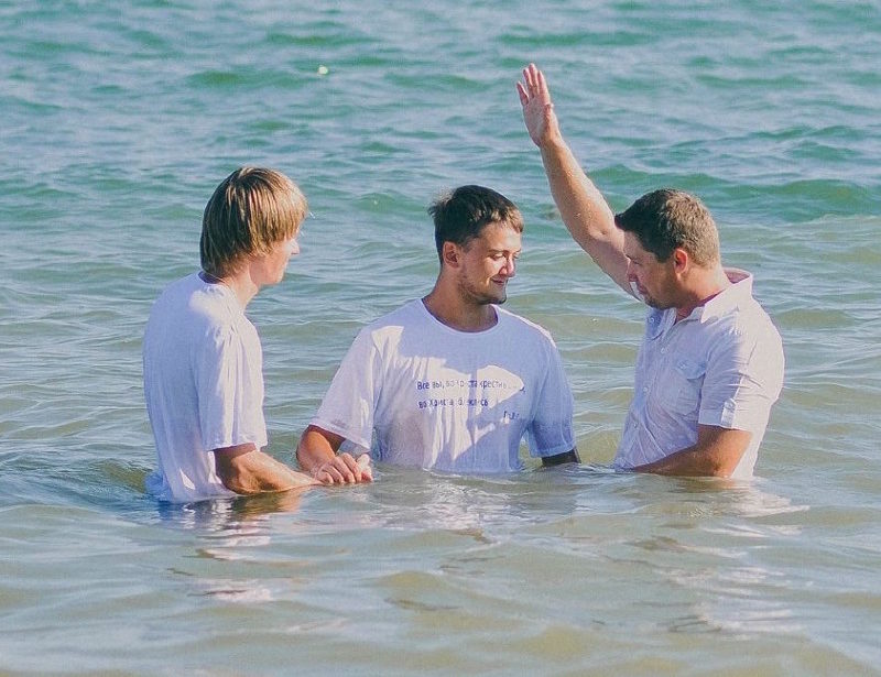 School Without Walls leader being baptized