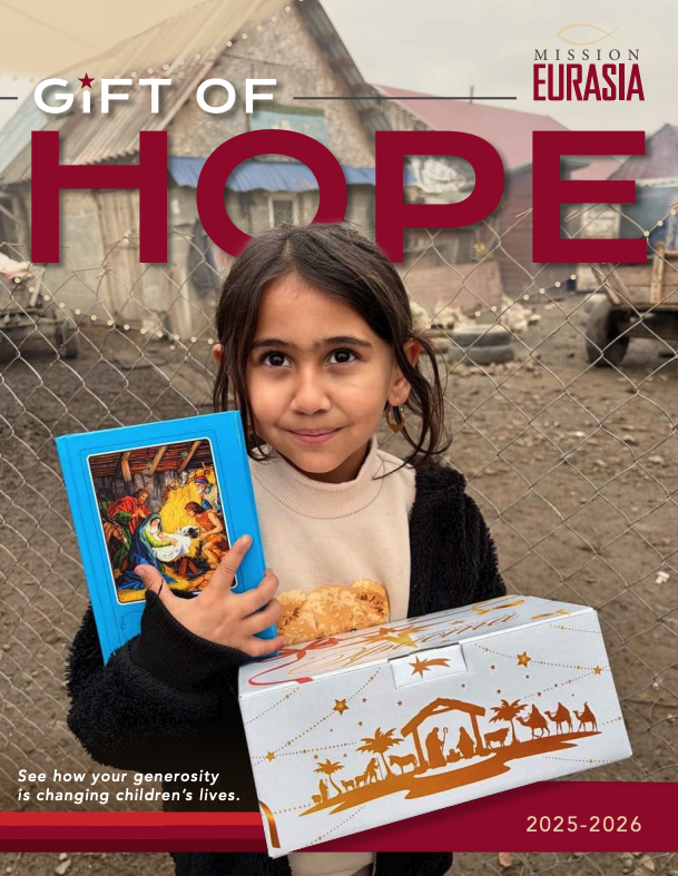 report cover of young girl holdibg bible and box from Gift of hope