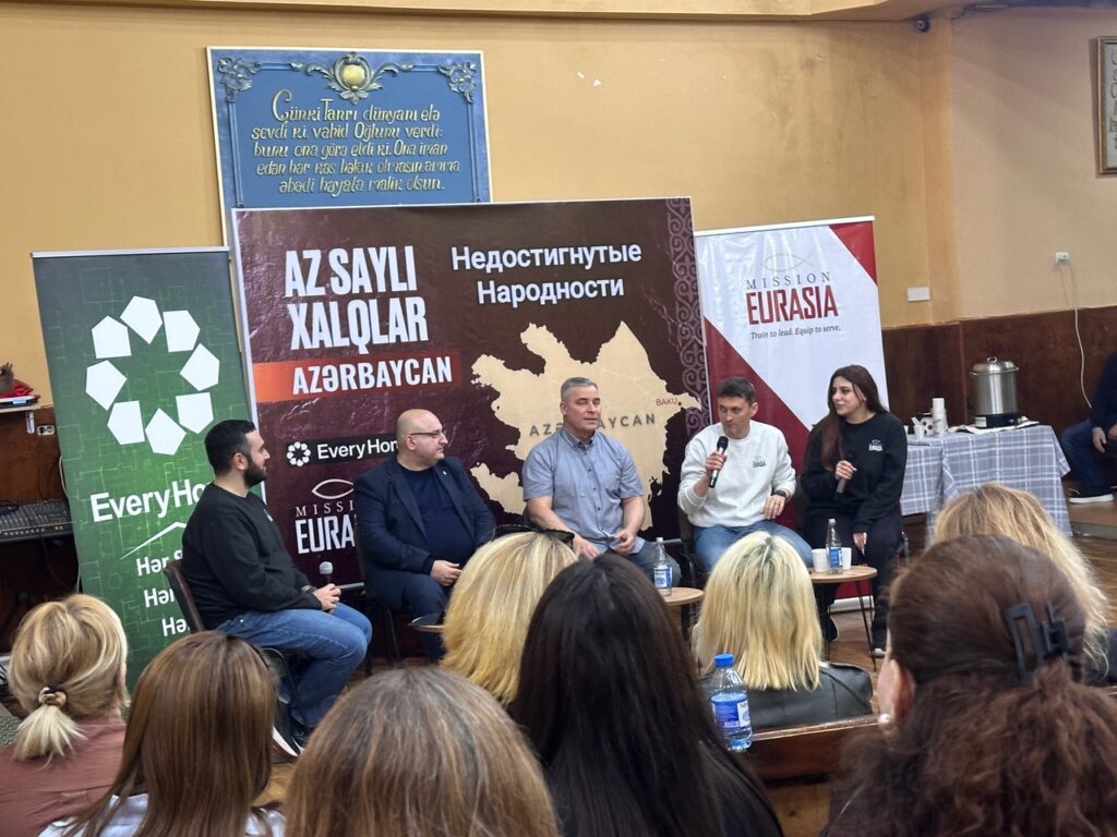 Panel of speakers at a Mission Eurasia conference discussing the prayer movement for unreached people groups in Azerbaijan.