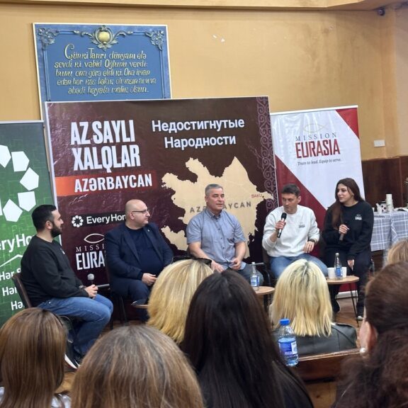 Panel of speakers at a Mission Eurasia conference discussing the prayer movement for unreached people groups in Azerbaijan.